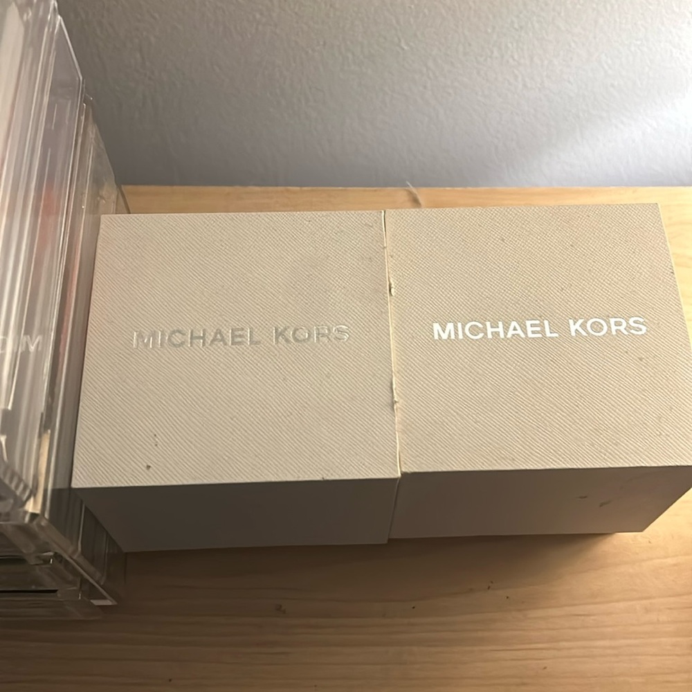 Michael Kors men’s watches 76 per watch or 110 for both.